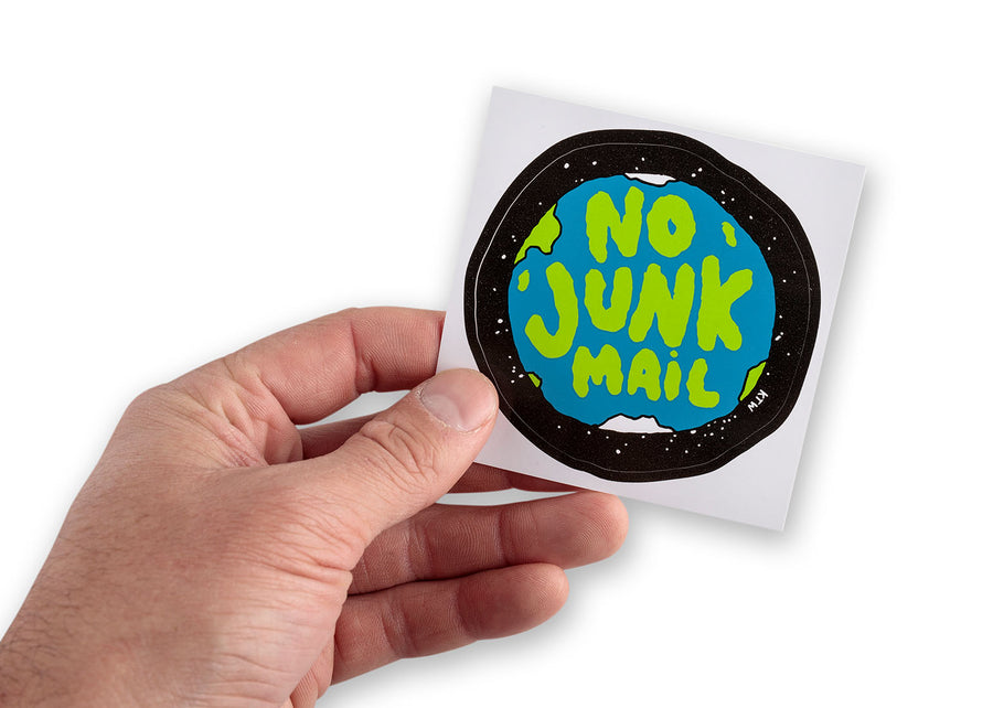 Male hand holding up Earth in space no junk mail sticker by Keep Tassie Wild